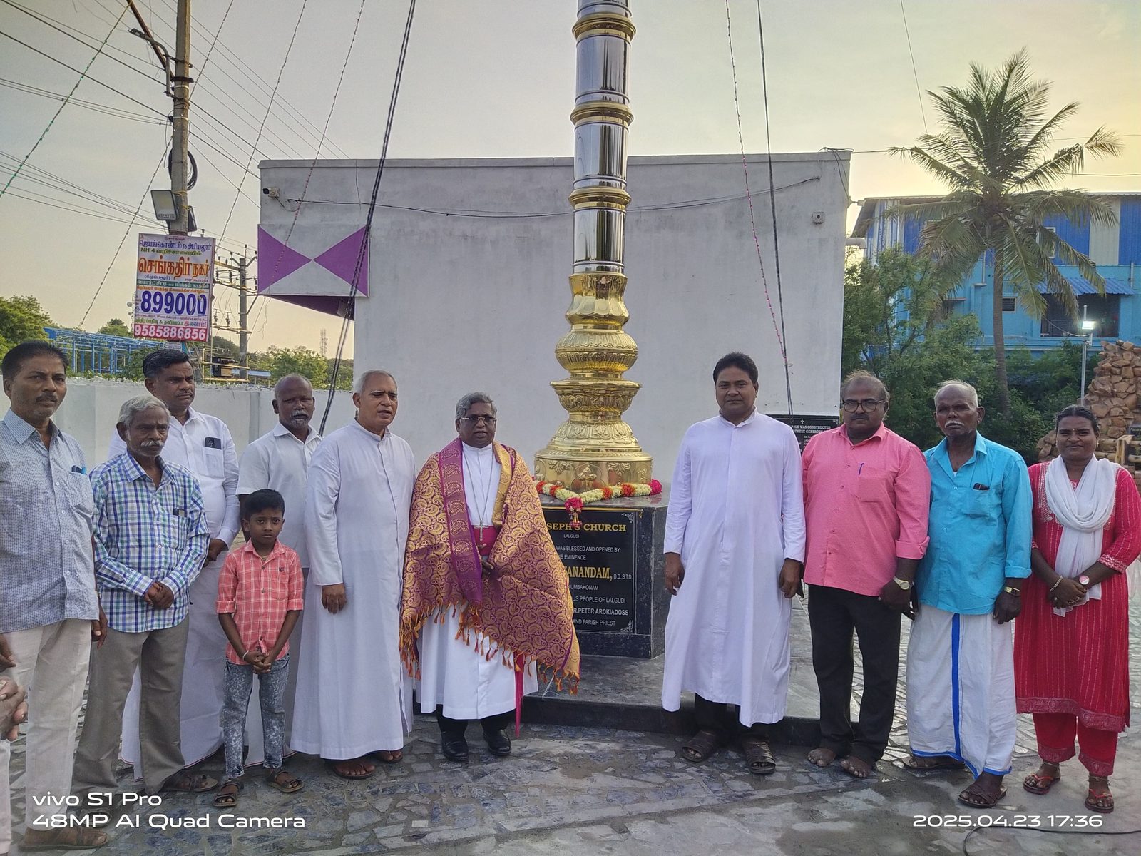 Parishioners at the flagpole-blessing ceremony